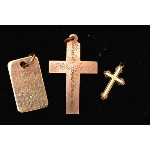 80 - THREE 9CT GOLD PENDANTS, the first a rose gold cross pendant with personal engravings all round, hal... 