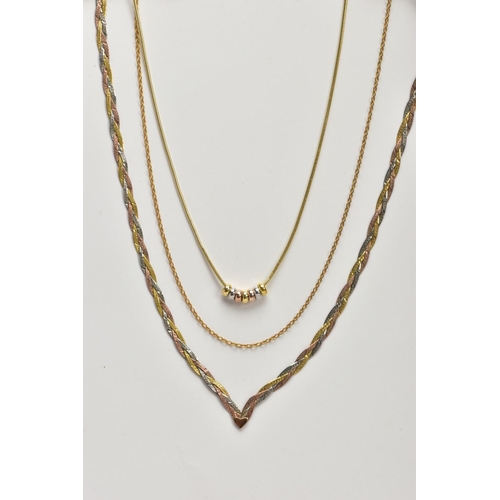 85 - THREE 9CT GOLD NECKLACES, the first a tri-colour plaited V-shape chain fitted with a spring clasp ha... 