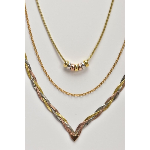 85 - THREE 9CT GOLD NECKLACES, the first a tri-colour plaited V-shape chain fitted with a spring clasp ha... 