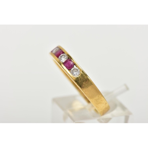 98 - A RUBY AND DIAMOND HALF HOOP RING, yellow metal band, designed with a row of three channel set circu... 