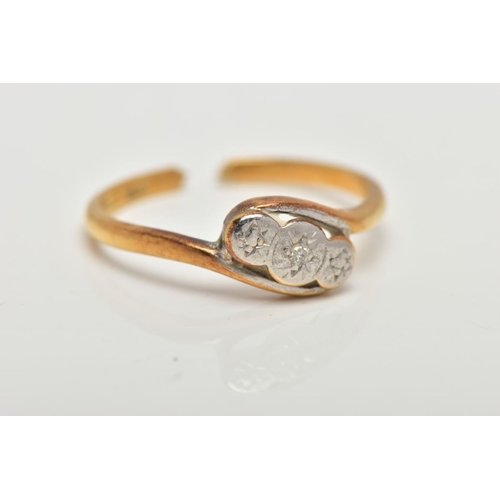 99 - AN AF YELLOW METAL DIAMOND RING, of a cross over design with a central illusion set single cut diamo... 