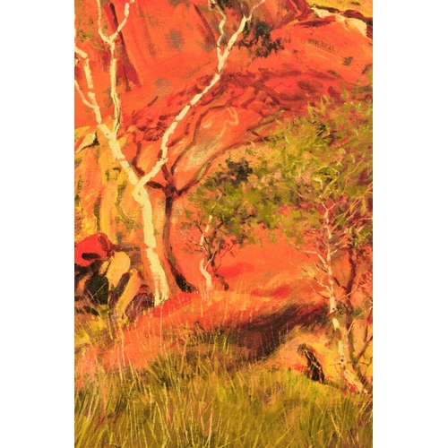 434 - ROLF HARRIS (AUSTRALIAN 1930) 'SUN ON DEVIL'S MARBLES', a limited edition print of an Australian lan... 