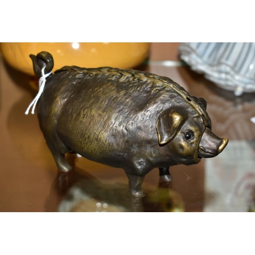 447 - A 19TH CENTURY STYLE NOVELTY BRONZE TABLE BELL IN THE FRORM OF A PIG, fitted with a clockwork moveme... 