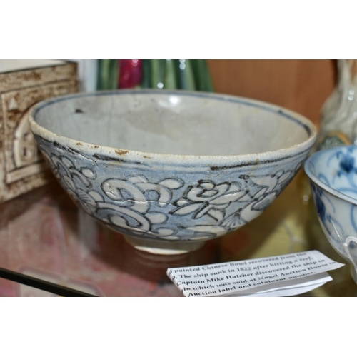 453 - A TEK SING CARGO BOWL, blue and white foliate decoration, the underside bearing adhesive Nagel Aucti... 