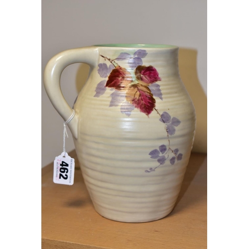 462 - A CLARICE CLIFF WILKINSON LTD HANDLED MOULDED AND RIBBED VASE PAINTED WITH BLACKBERRIES AND BRAMBLES... 