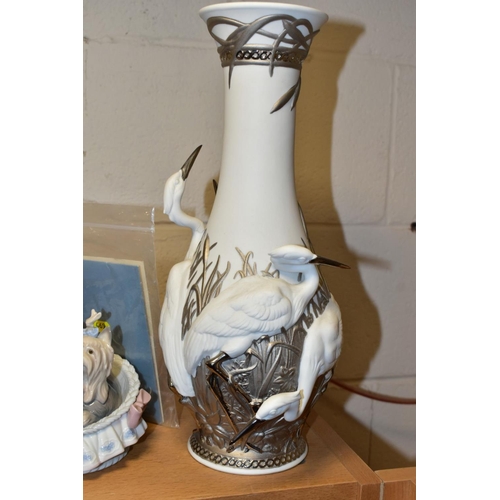 469 - TWO PIECES OF LLADRO PORCELAIN, comprising a Herons Realm, no 7053, silver lustre and parian vase, h... 