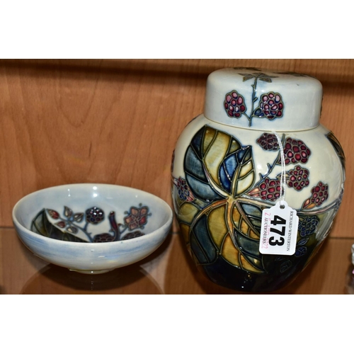 473 - TWO PIECES OF MOORCROFT SECONDS DECORATED IN A BRAMBLE PATTERN, comprising a ginger jar and cover, p... 