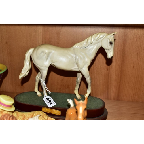 484 - THREE ROYAL DOULTON ANIMAL FIGURES AND A BESWICK FOAL, the Royal Doulton comprising  'Desert Orchid'... 