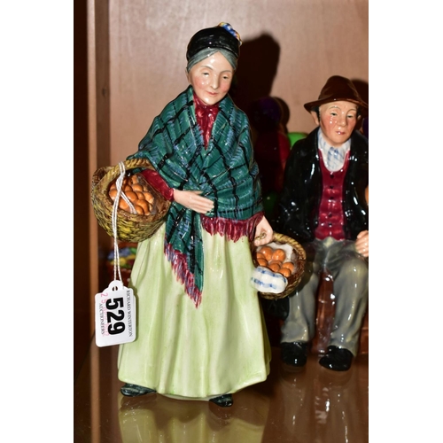 529 - FOUR ROYAL DOULTON FIGURES AND A CHARACTER JUG, comprising 'The Orange Lady' HN1953, 'The Old Balloo... 