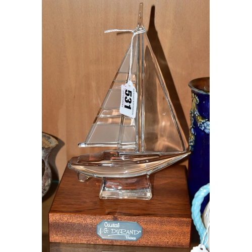 531 - A J G DURAND OF FRANCE MOULDED CRYSTAL MODEL OF A SMALL SAILING BOAT, with a separate wooden plinth,... 