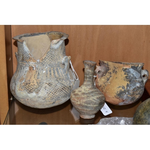 532 - A GROUP OF ANTIQUITIES AND COINS, the ceramic items comprise a painted amphora from the Middle Cypri... 