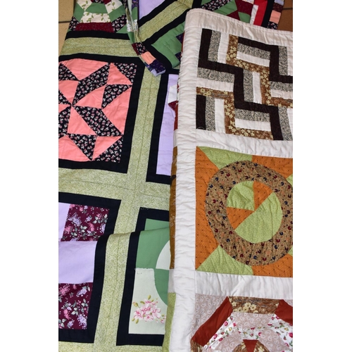 535 - A BOX CONTAINING FIVE MODERN PATCHWORK QUILTS, sizes are  144cm x 110cm (lilac/white), 196cm x 154cm... 