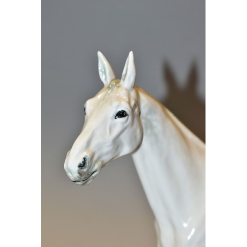 539 - A ROYAL DOULTON HORSE 'MERELY A MINOR' IN WHITE, HN2538, height 22.5cm (Condition report: good condi... 