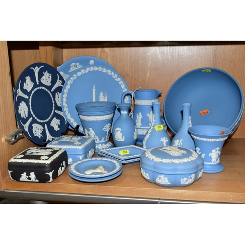 552 - SEVENTEEN PIECES OF WEDGWOOD JASPERWARE, mostly pale blue, includes a dark blue plate, diameter 20.5... 