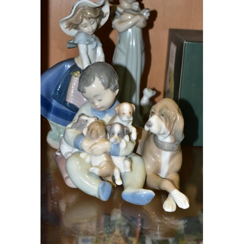 558 - FOUR LLADRO FIGURES OF CHILDREN, comprising Little Daisy, no. 8041, sculpted by Jose Santaeulalia, i... 