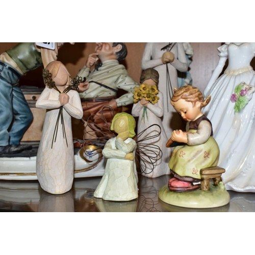 566 - NINE CERAMIC AND RESIN FIGURINES, comprising a Capodimonte porcelain figure group of a tailor and hi... 