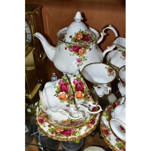 569 - A ROYAL ALBERT OLD COUNTRY ROSES TEA SET, comprising a tea pot, height 18cm, milk jug, sugar bowl, a... 