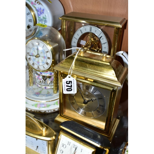 570 - SEVEN ASSORTED MANTEL, DESK AND TRAVEL CLOCKS, comprising a quartz Woodford brass finish mantel cloc... 