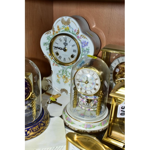 570 - SEVEN ASSORTED MANTEL, DESK AND TRAVEL CLOCKS, comprising a quartz Woodford brass finish mantel cloc... 