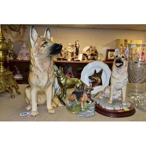 576 - A GROUP OF GERMAN SHEPHERD DOG COLLECTABLES, comprising a large Beswick Seated Alsatian, impressed 2... 