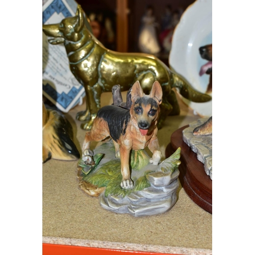 576 - A GROUP OF GERMAN SHEPHERD DOG COLLECTABLES, comprising a large Beswick Seated Alsatian, impressed 2... 