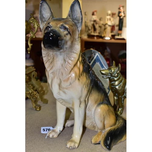 576 - A GROUP OF GERMAN SHEPHERD DOG COLLECTABLES, comprising a large Beswick Seated Alsatian, impressed 2... 