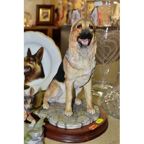 576 - A GROUP OF GERMAN SHEPHERD DOG COLLECTABLES, comprising a large Beswick Seated Alsatian, impressed 2... 