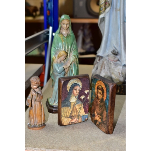 579 - A GROUP OF CHRISTIAN RELIGIOUS STATUES AND ICONS, to include a carved wooden statue of Our Lady of L... 