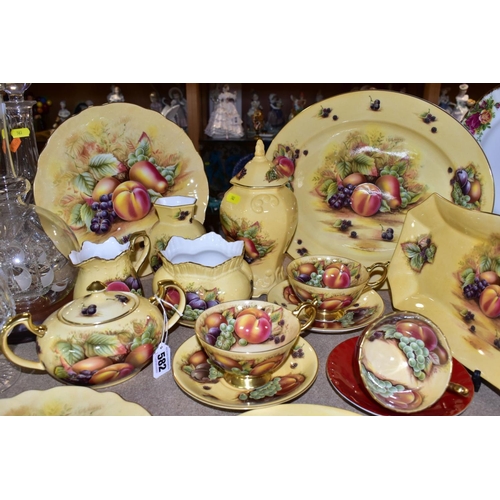 582 - A COLLECTION OF AYNSLEY ORCHARD GOLD GIFT AND TEAWARES, nineteen pieces comprising two breakfast cup... 