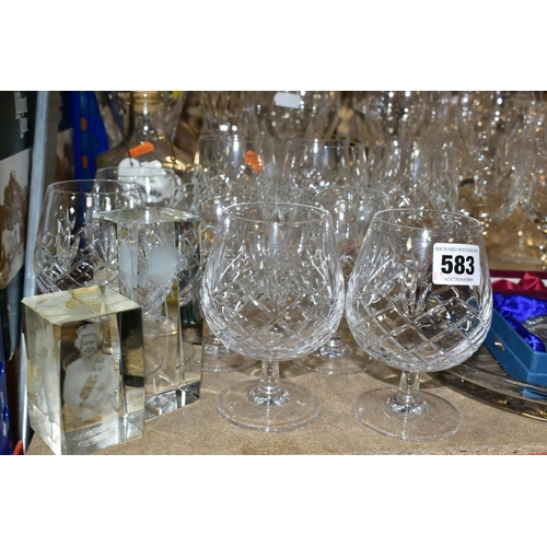 583 - A GROUP OF CUT CRYSTAL AND OTHER GLASSWARES, approximately forty to fifty pieces to include a Waterf... 