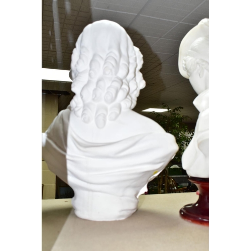 591 - TWO FEMALE BUSTS, one cast in resin after Alain Gianelli, depicting a woman in a plumed hat, support... 