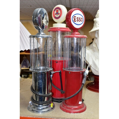 592 - THREE NOVELTY DRINKS DISPENSERS, in the style of vintage American gasoline pumps marked Esso, Drink ... 