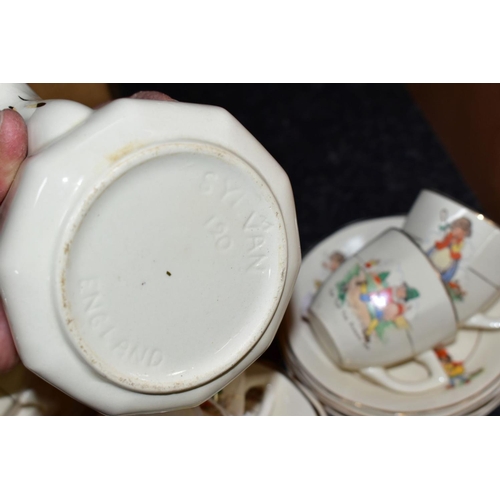 622 - A TWENTY ONE PIECE SYLVAN NURSERY WARE TEA SET, printed with Nursery Rhyme characters, comprising a ... 