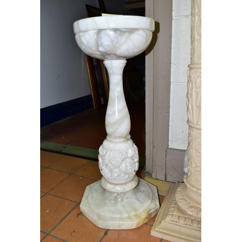 630 - THREE DECORATIVE PEDESTALS, comprising two carved alabaster examples, heights 59cm and 72cm, on octa... 