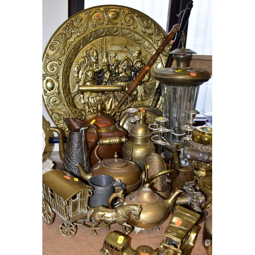 670 - A GROUP OF BRASS AND OTHER METAL WARES, to include a very large brass charger diameter approximately... 