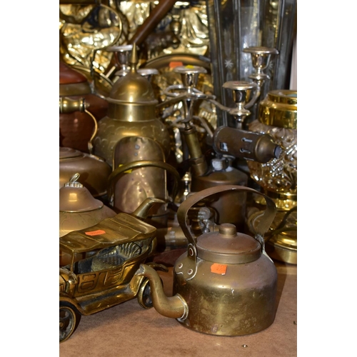 670 - A GROUP OF BRASS AND OTHER METAL WARES, to include a very large brass charger diameter approximately... 