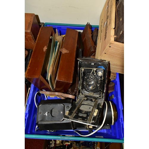 675 - SEVEN BOXES OF ANTIQUE AND VINTAGE CAMERAS, to include a Zeiss Ikon sheet film camera with Compur sh... 