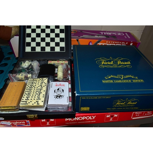 685 - THREE GAMES AND A BOXED TRIPOD, ETC, comprising a cased games compendium including dominoes, chess, ... 