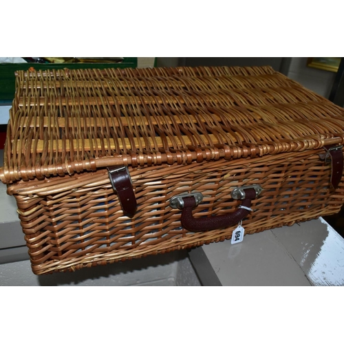 694 - A BROOKES BASKETS WICKER PICNIC HAMPER FOR FOUR PLACE SETTINGS, comprising four Churchill pottery pl... 