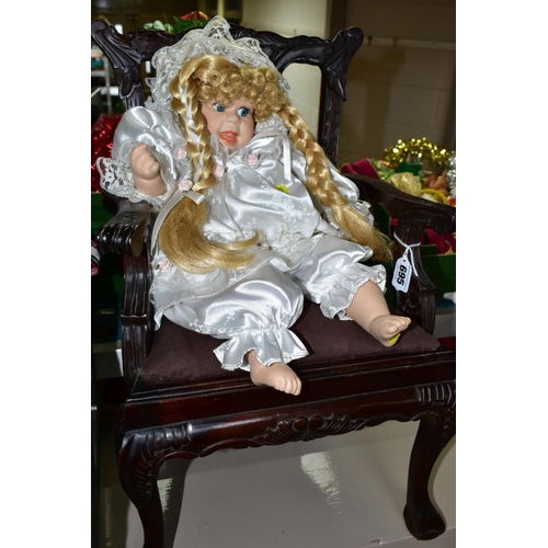 695 - A BOX OF ASSORTED DOLLS AND A REPRODUCTION MAHOGANY STAINED CHIPPENDALE STYLE DOLL'S CHAIR, height o... 