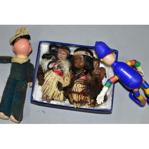 751 - VINTAGE COLLECTORS DOLLS, comprising a M?ori woman with child, tiki pendant around her neck, painted... 