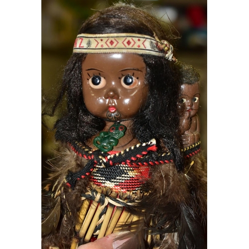 751 - VINTAGE COLLECTORS DOLLS, comprising a M?ori woman with child, tiki pendant around her neck, painted... 