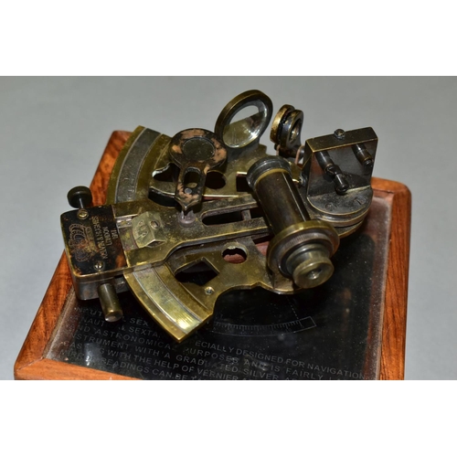 752 - A KELVIN & HUGHES NAUTICAL SEXTANT DATED 1917, together with a wooden stowage box with an etched gla... 