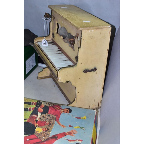 756 - A VINTAGE  UPRIGHT TOY PIANO OF WOOD CONSTRUCTION, painted finish, twelve keys in need of restoratio... 