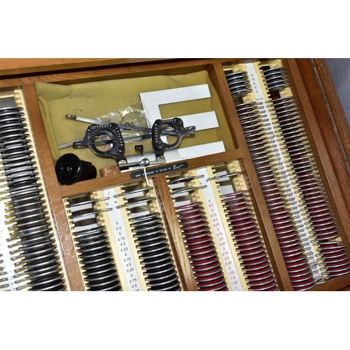 761 - RAYNER OF ENGLAND OPTICIANS SIGHT TESTING SET, to include a pair of adjustable Clement Clarke dioptr... 