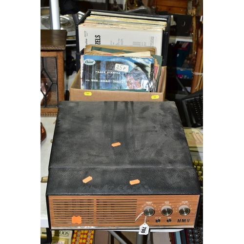 780 - VINTAGE PORTABLE RECORD PLAYER AND RECORDS, comprising a HMV 2022 record player, 7 inch singles to i... 