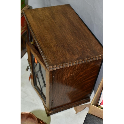 781 - AN OAK SMOKERS CABINET, lacks tobacco jar and key, approximate dimensions - height 29cm, width 31cm,... 