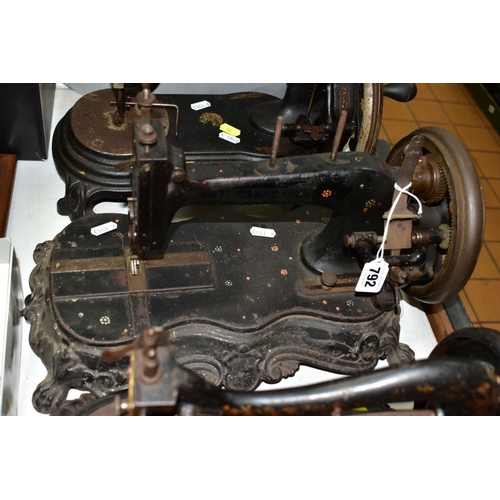 792 - THREE VICTORIAN CAST IRON SEWING MACHINES, hand cranked mechanism, with gilt or painted decoration o... 