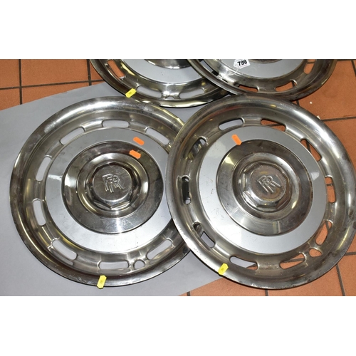 799 - A SET OF FOUR CHROME ROLLS ROYCE HUB CAPS,  diameter 42.5cm, with light grey band and central Rolls ... 