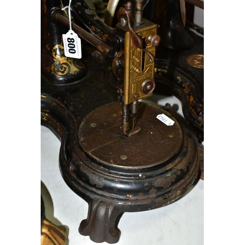 800 - THREE ANTIQUE JONES CAST IRON SEWING MACHINES, hand cranked mechanism, with gilt or painted decorati... 